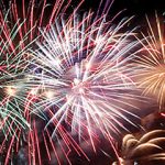 Colorful fireworks burst in the night sky during the L.L. Bean Northern Lights celebration in Freeport, Maine.