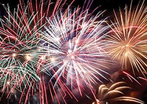 Colorful fireworks burst in the night sky during the L.L. Bean Northern Lights celebration in Freeport, Maine.